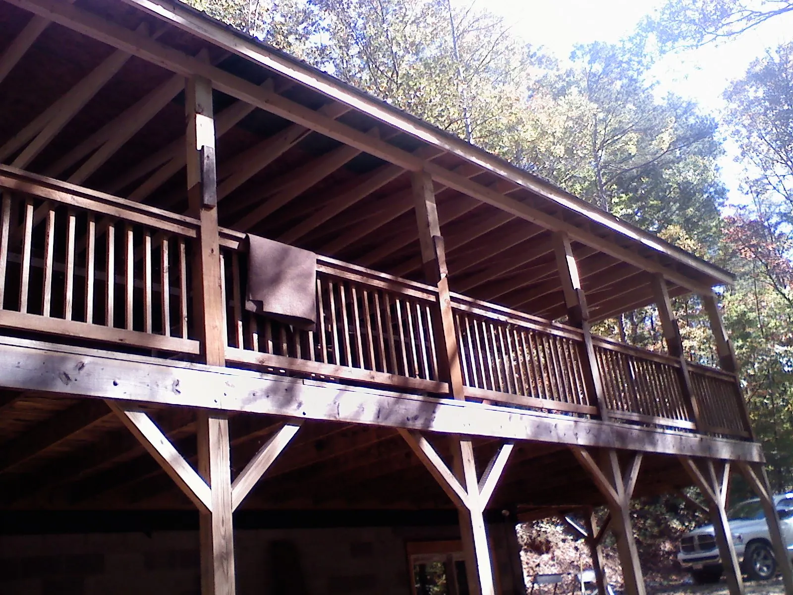 Timber framing under a new elevated porch and deck — Roof Leak Repair in Minford by Roofing Brothers